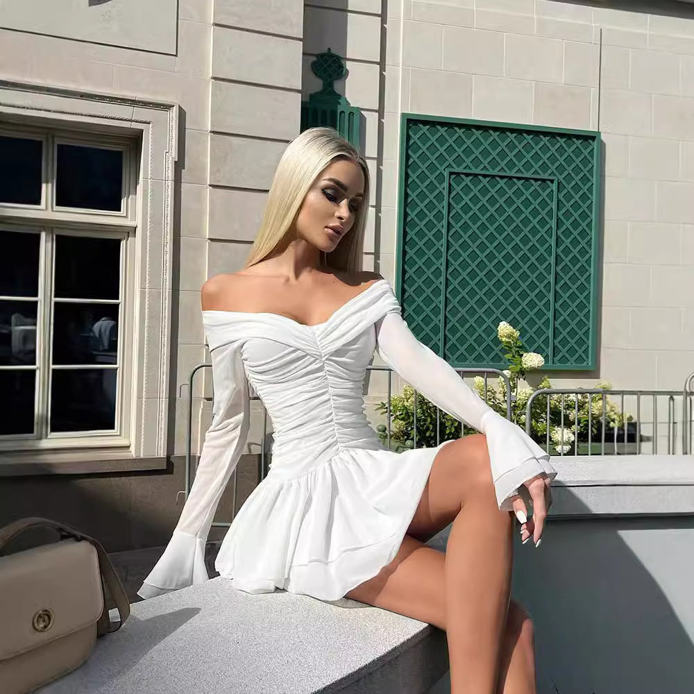 One shoulder flared long sleeved dress with slimming and pleated A-line short skirt