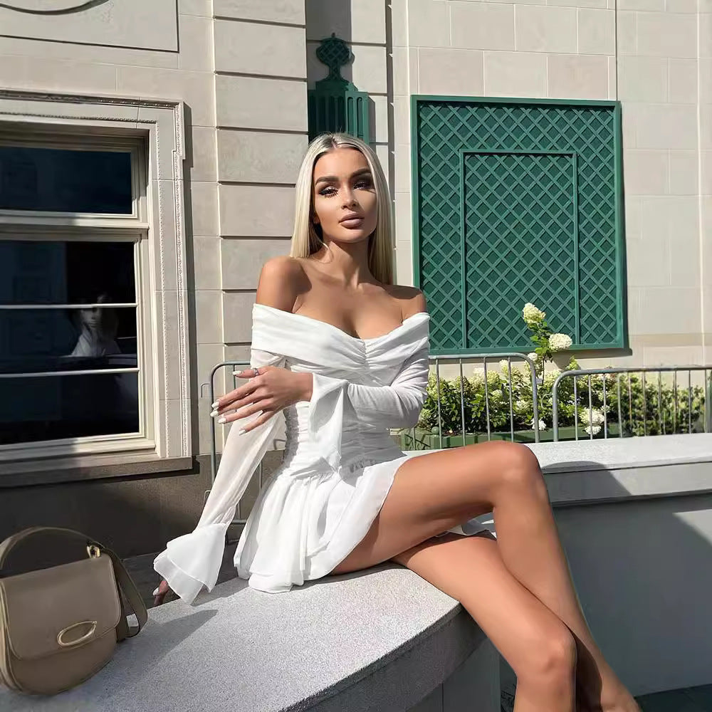 One shoulder flared long sleeved dress with slimming and pleated A-line short skirt