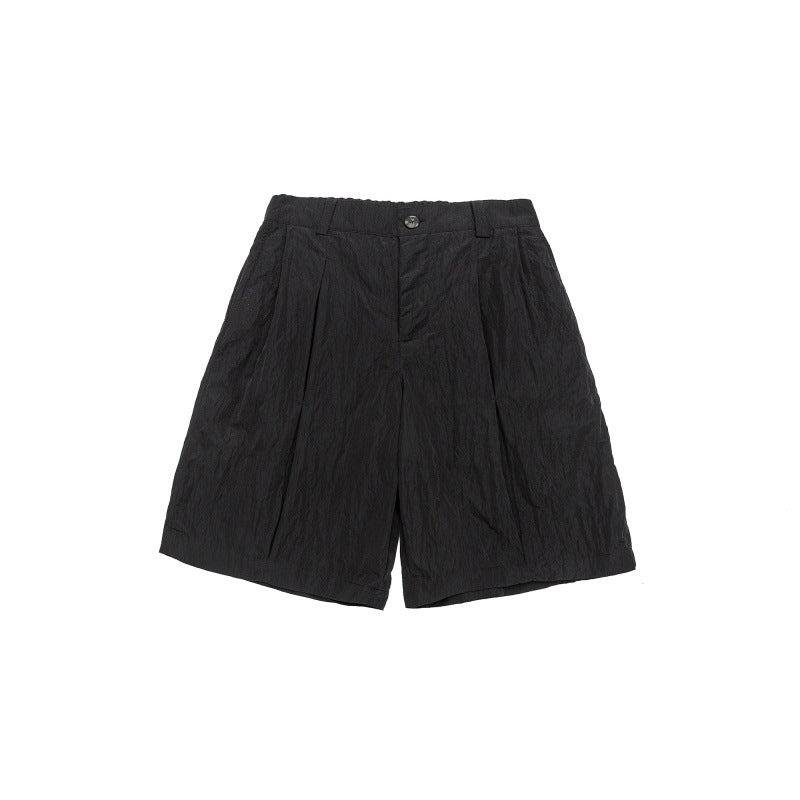 Solid color loose silhouette anti splash water pressure pleated suit shorts for men