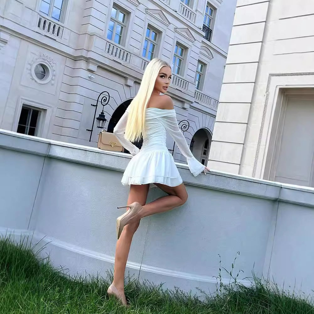 One shoulder flared long sleeved dress with slimming and pleated A-line short skirt