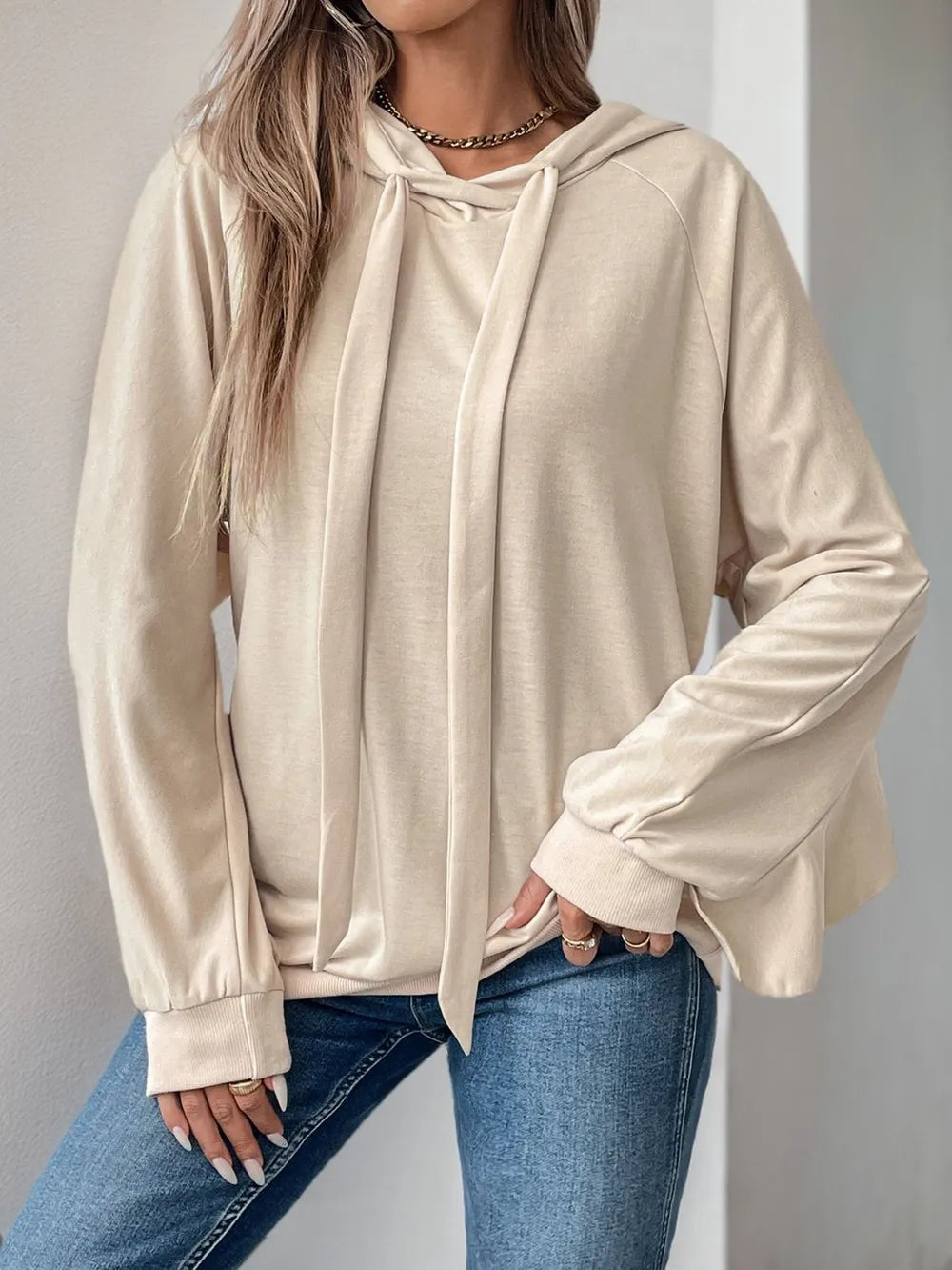 Sports and leisure personalized hooded ruffled long sleeved solid color hoodie for women
