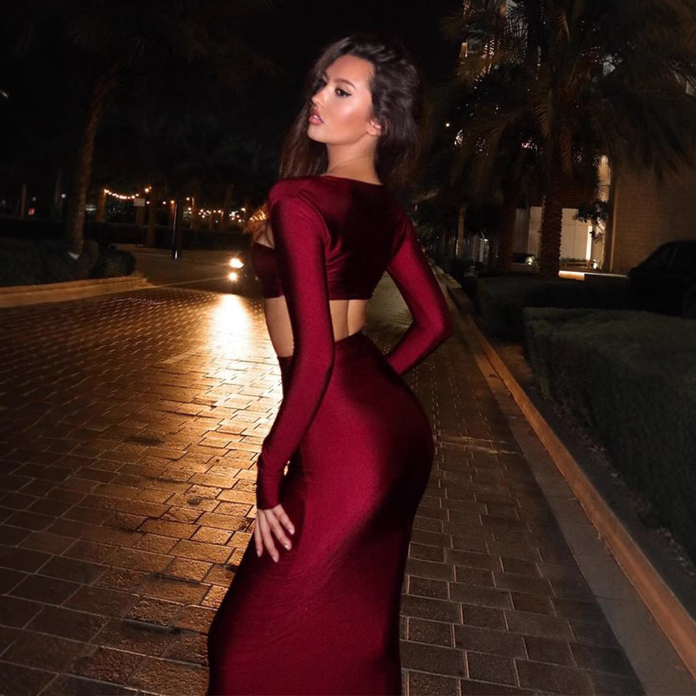 Sexy waist exposed long sleeved chest wrapped top hip wrapped skirt two-piece set