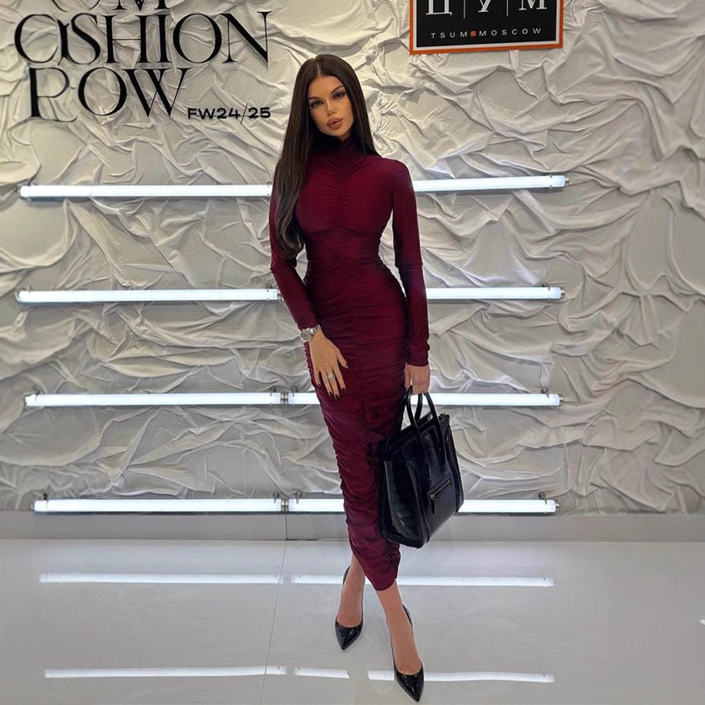 Long sleeved pleated dress with buttocks wrapped long skirt