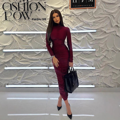 Long sleeved pleated dress with buttocks wrapped long skirt