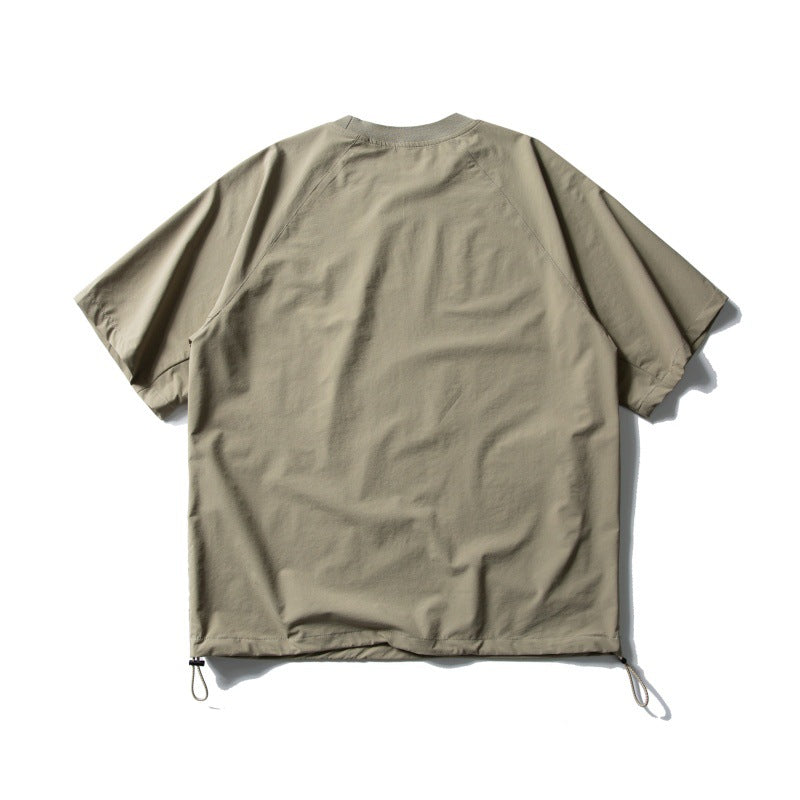Zipper pocket breathable quick drying loose sports short sleeved shirt